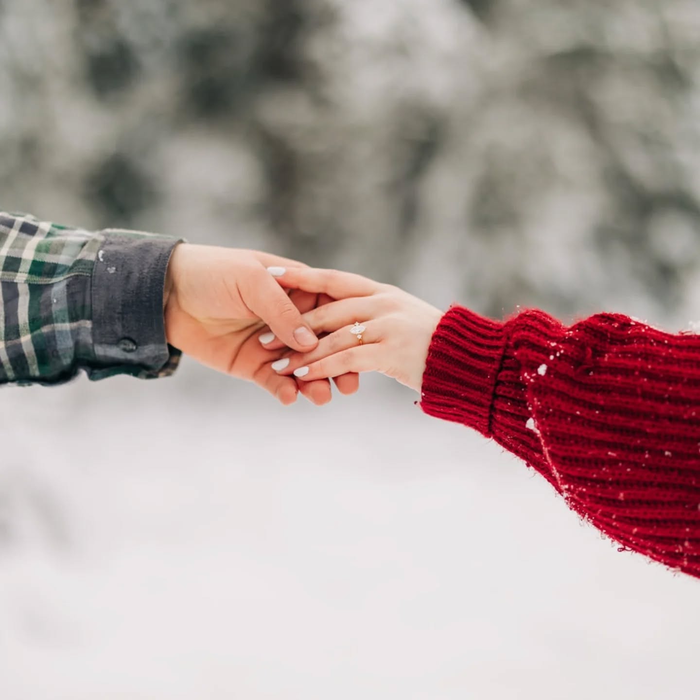 Mallory and Kayle hands with engagement ring